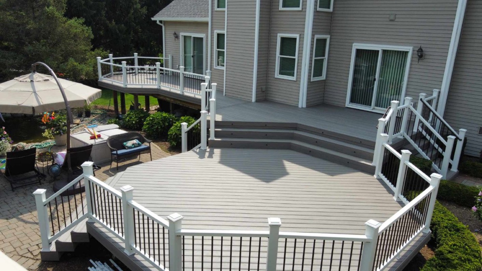 Multi-level deck with patio seating area
