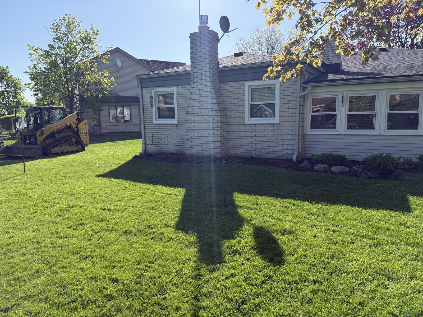 Backyard before paver patio installation in Macomb, MI